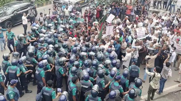 Dismissed BDR members heading towards Jamuna dispersed by police water cannon in Kakrail